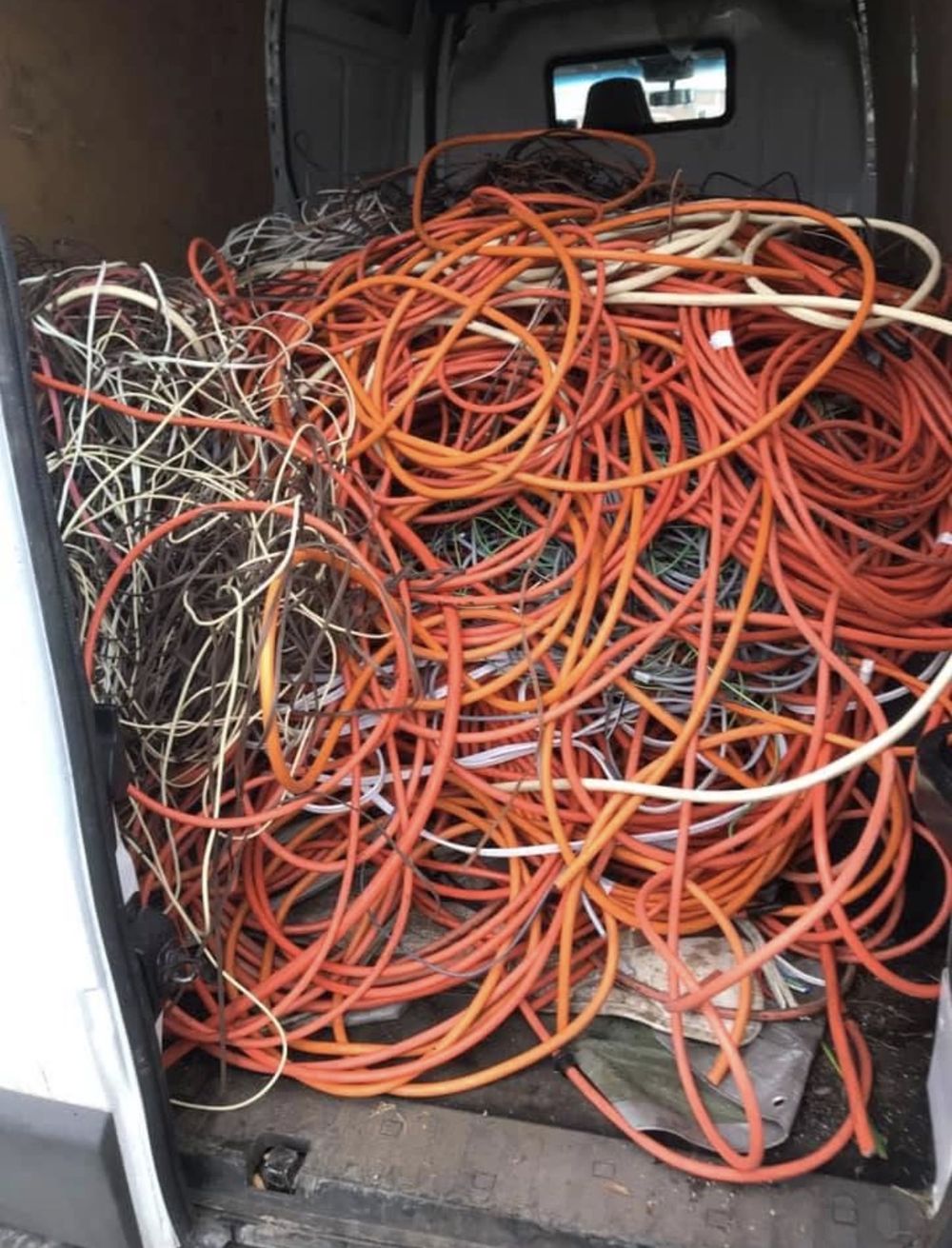 Van loaded with scrap copper cable on a scrap metal pickup in Melbourne's east